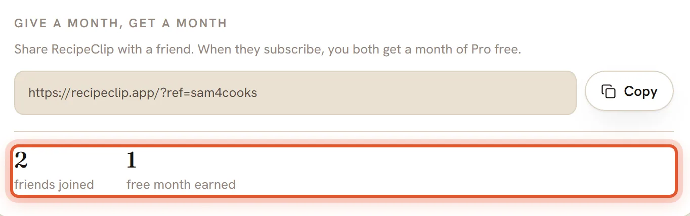 The Give a month, get a month box after two friends joined. Below the link, two friends joined and one free month earned are shown, with the friends joined count ringed.