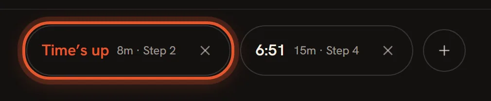 The timer bar with the first timer turned orange and reading Time's up, ringed, next to a second timer still counting.