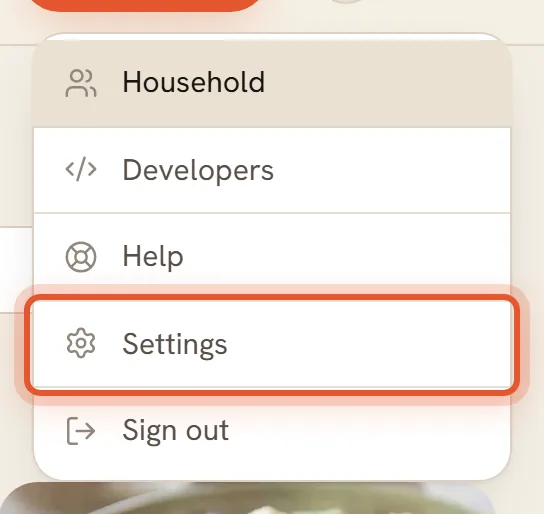 On a computer, the account menu open with Settings ringed. On a phone, the initial at the top right ringed; tapping it opens Settings.
