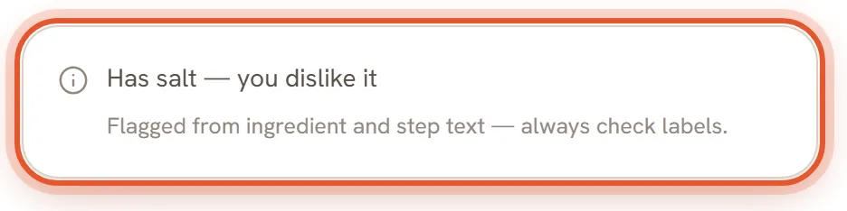A plain card, not red, with a small info icon and one line: Has salt, you dislike it. The footer says Flagged from ingredient and step text, always check labels. The card is ringed.