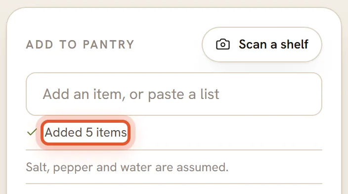 The Add to pantry card after a pasted list of five items. The message Added 5 items under the field is ringed.