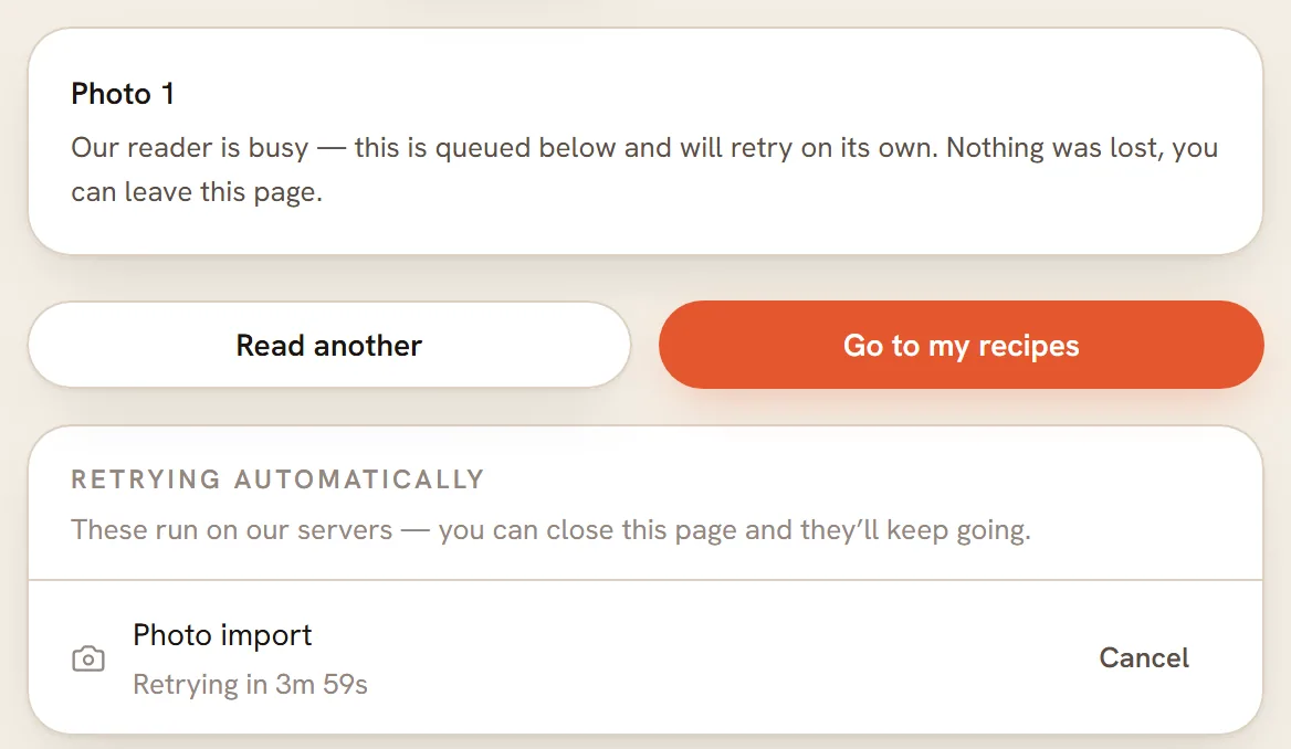 The card Photo 1 saying Our reader is busy and queued, with the Retrying automatically panel below it counting down.