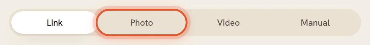 The row of four tabs, Link, Photo, Video and Manual, with Photo ringed.