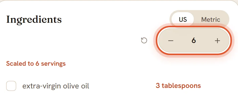 The servings box under the US and Metric switch reads 6 and is ringed; olive oil has changed to 3 tablespoons and a line reads Scaled to 6 servings.